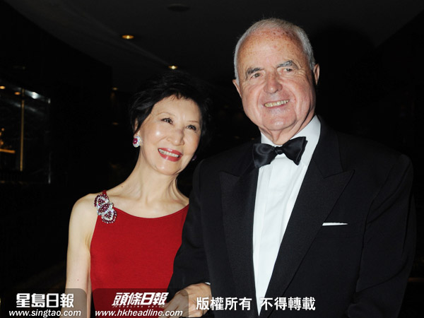 唐明治(左)與他的妻子鄧蓮如(右)