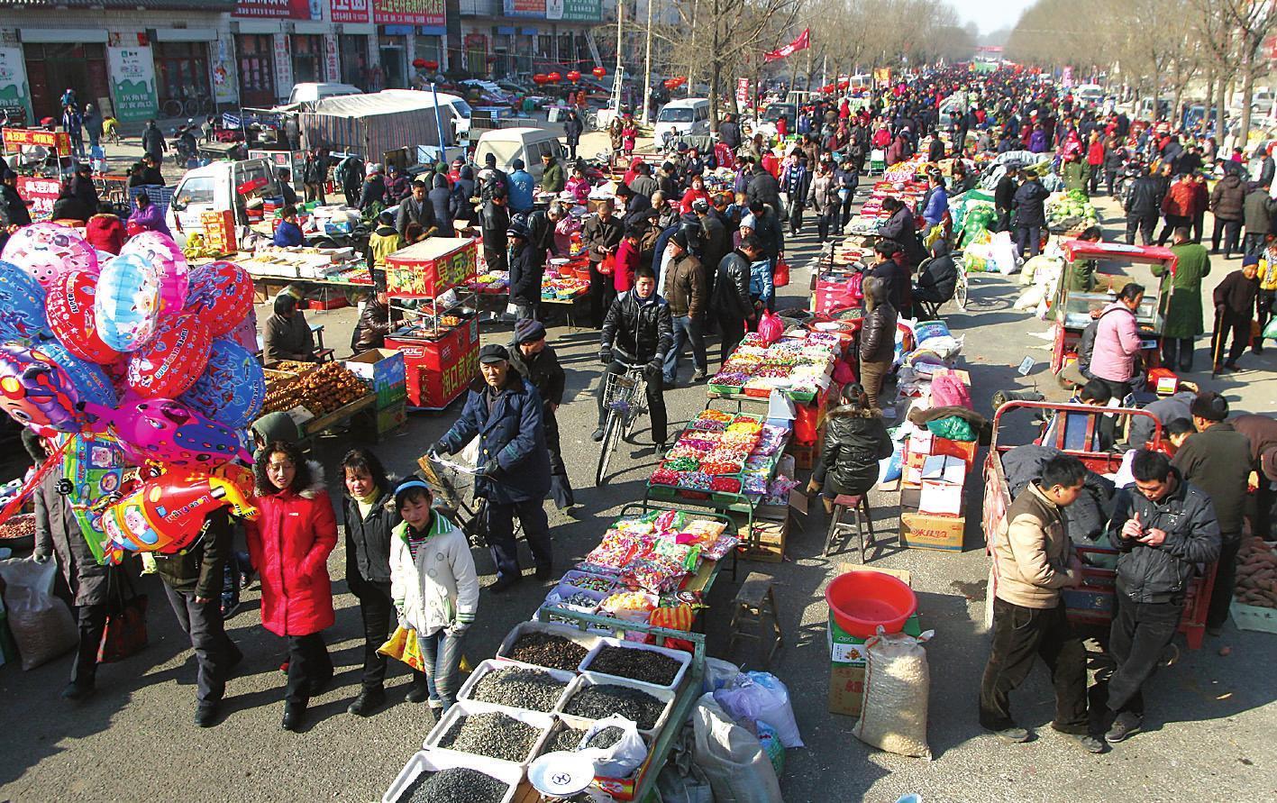 集市(定期或在固定地點買賣貨物的市場)